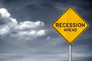 Preparing for a Recession: Save Money or Pay Off Debt?